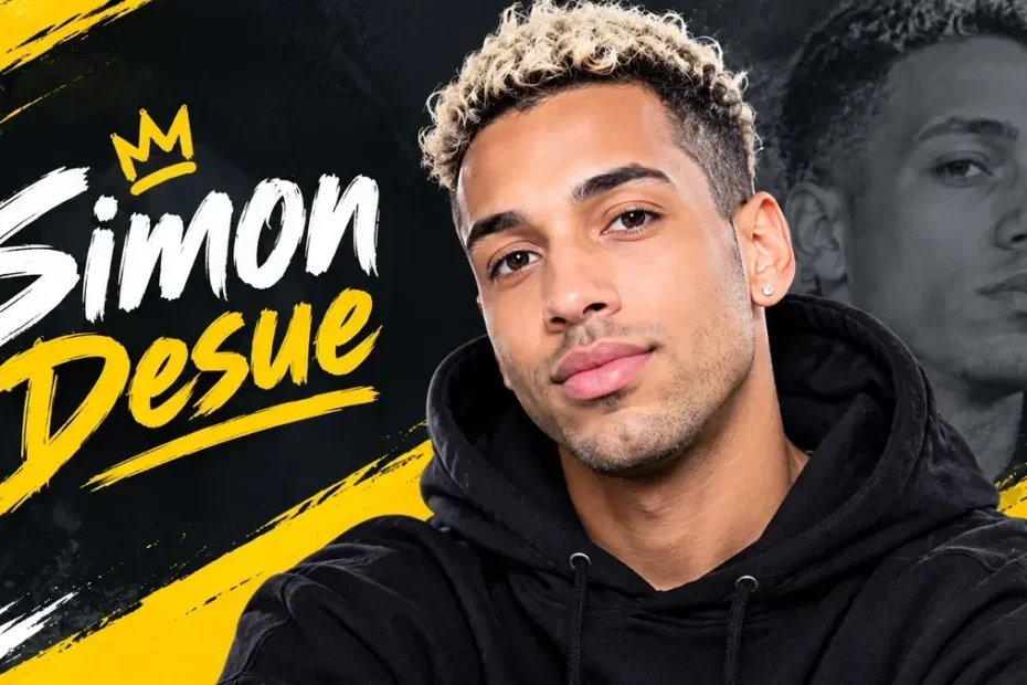 Simon Desue portrait in a black hoodie with yellow and white graphic lettering
