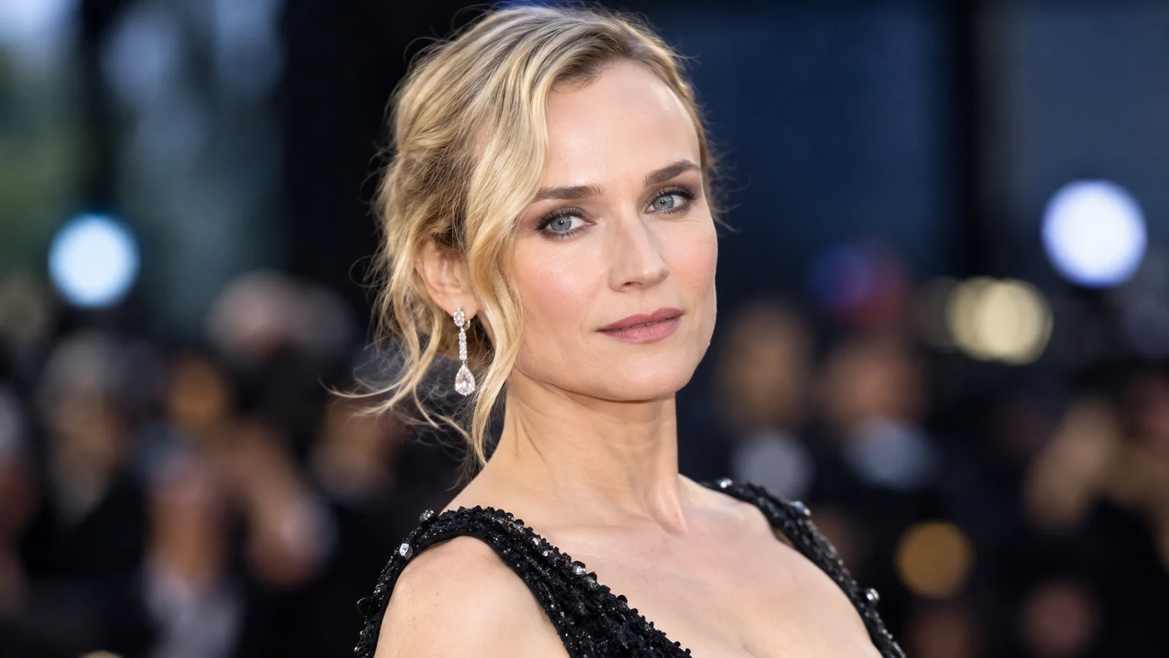 Diane Kruger-inspired blonde actress portrait in a glamorous black evening gown at a red-carpet event